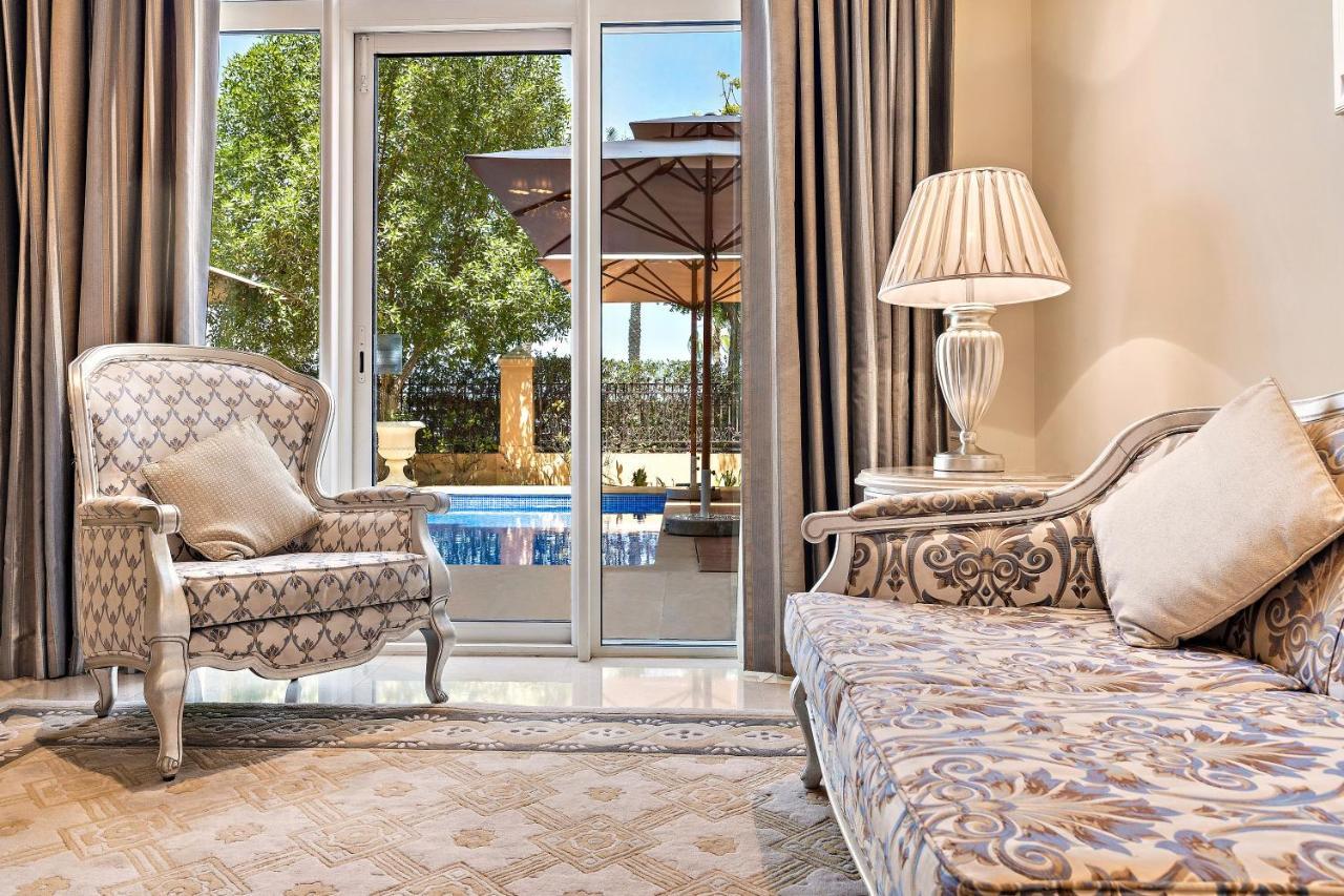 Kempinski Hotel & Residences Palm Jumeirah Dubai Buitenkant foto A room at the hotel